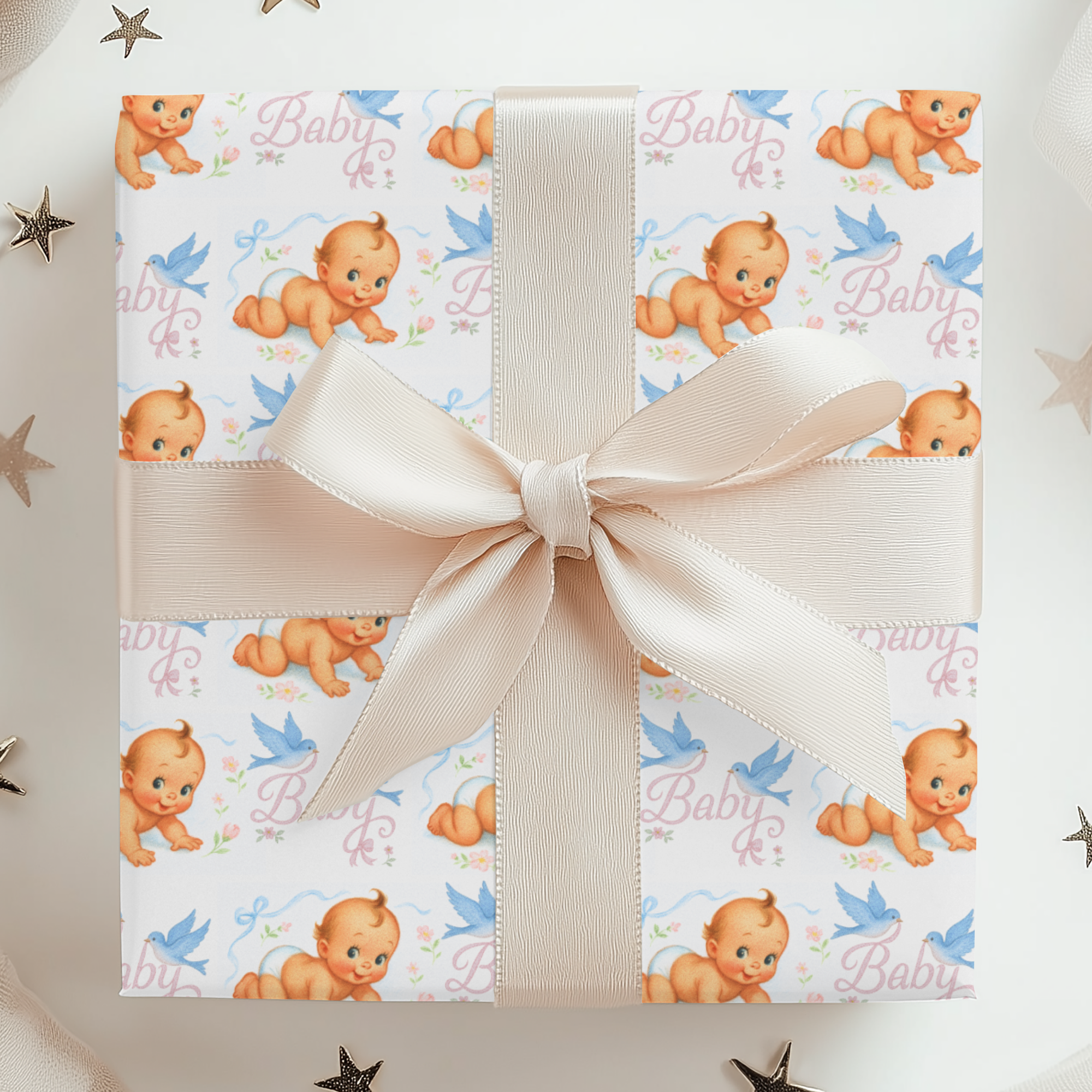 Gift box with baby-themed wrapping paper and a bow, surrounded by decorative stars.