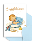 Baby shower card with illustration of a baby sitting in a cowboy hat, holding a blue elephant, surrounded by toys, on a white background.