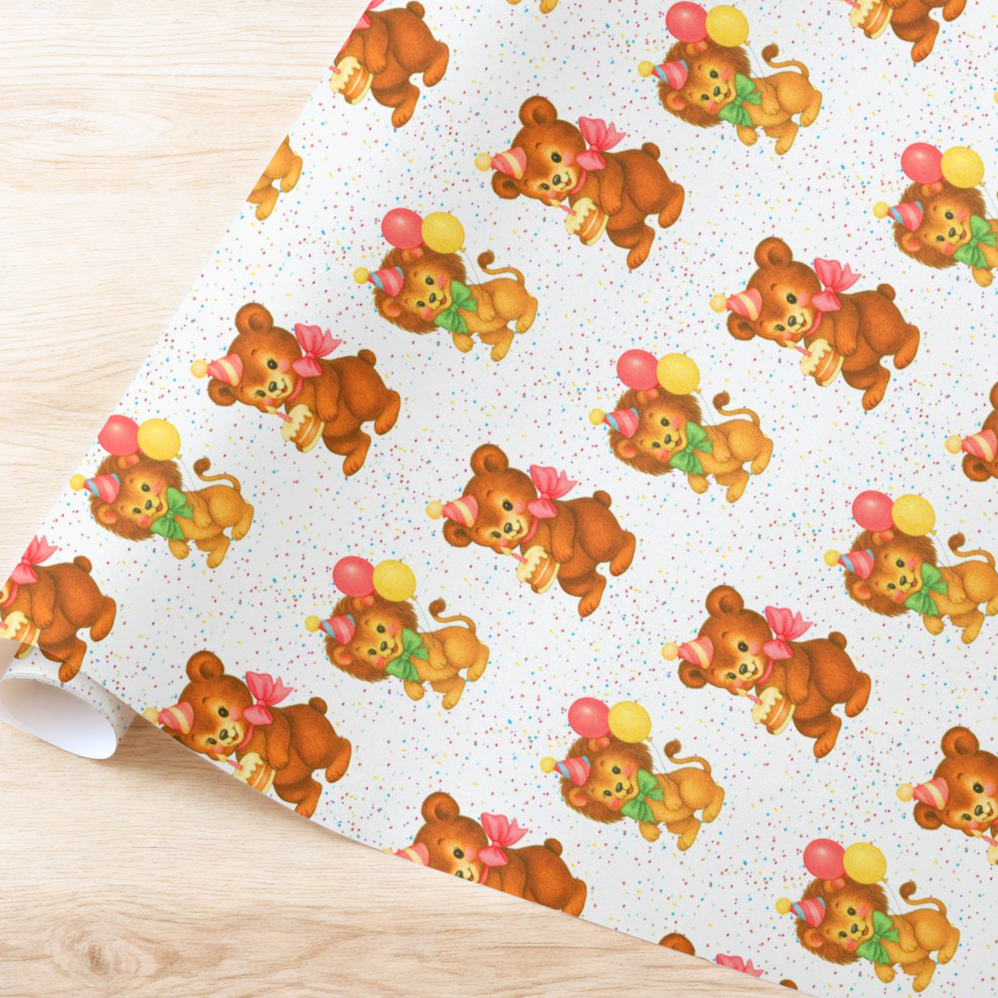 birthday wrapping paper roll in a retro theme featuring a bear and lion with balloons on a white background