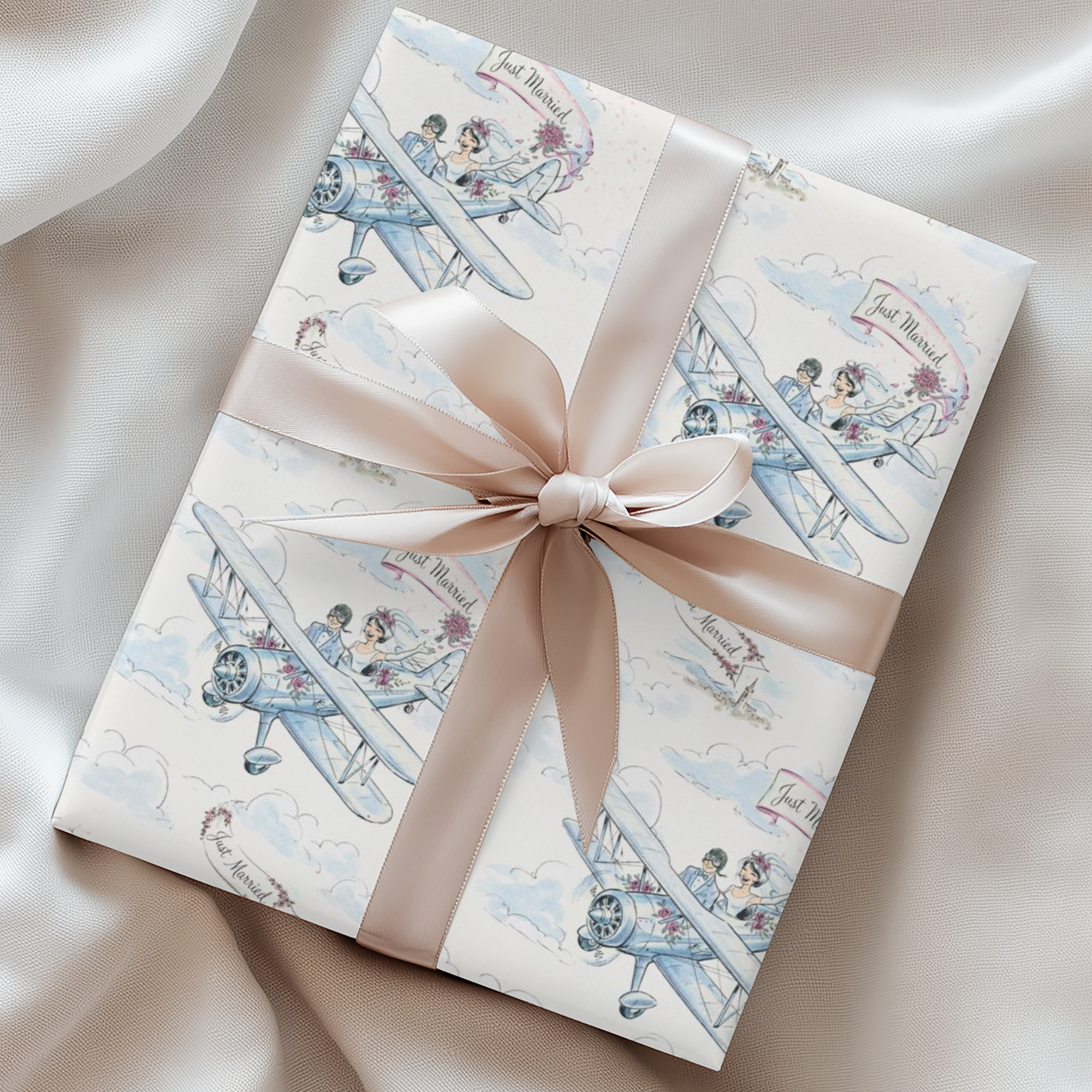 Bride tossing bouquet petals from a biplane as the couple flies through a light blue sky.