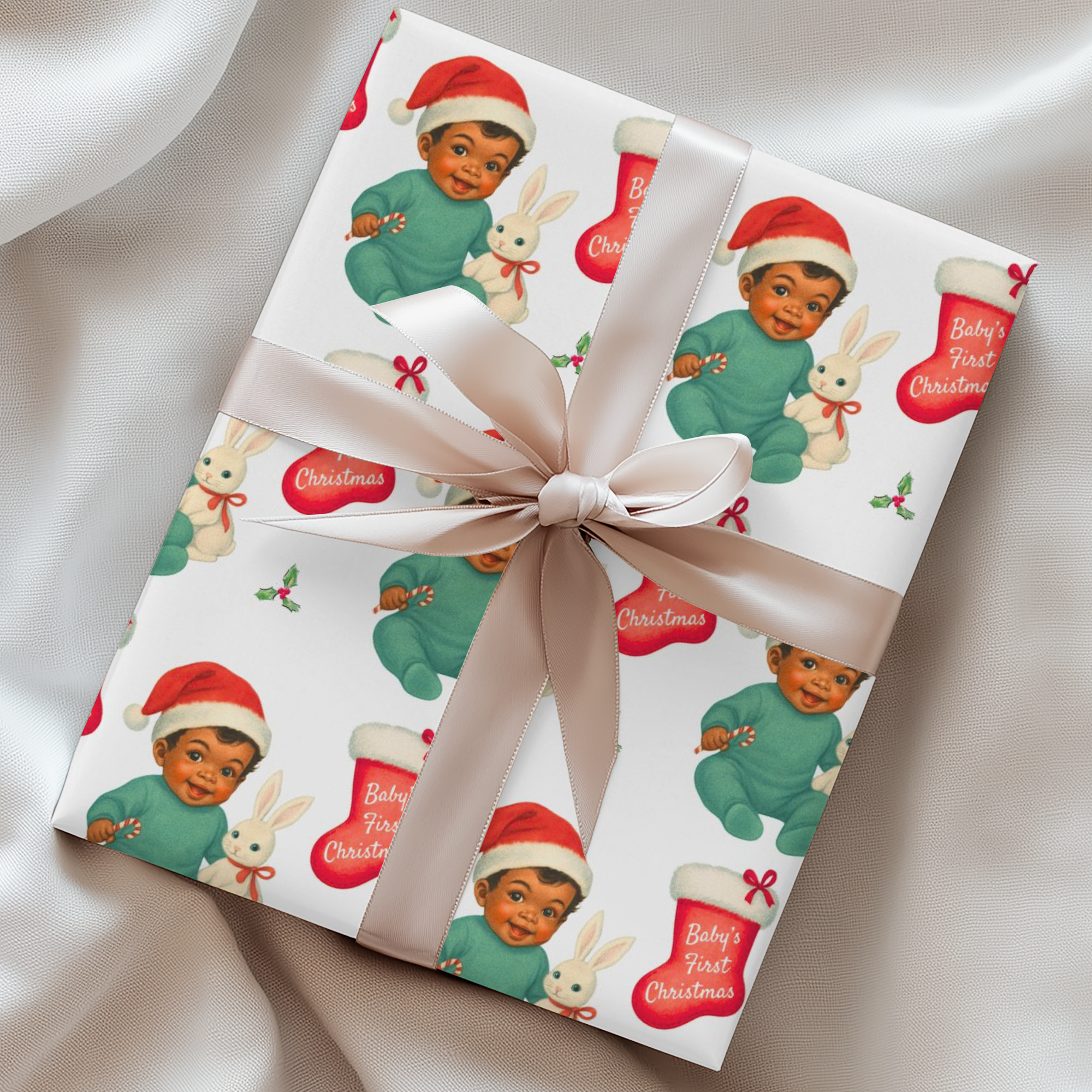 Vintage “Baby’s First Christmas” wrapping paper featuring a smiling dark-skinned baby in a mint green romper and Santa hat holding a white bunny plush and candy cane, surrounded by red Christmas stockings and holly, retro storybook illustration style.