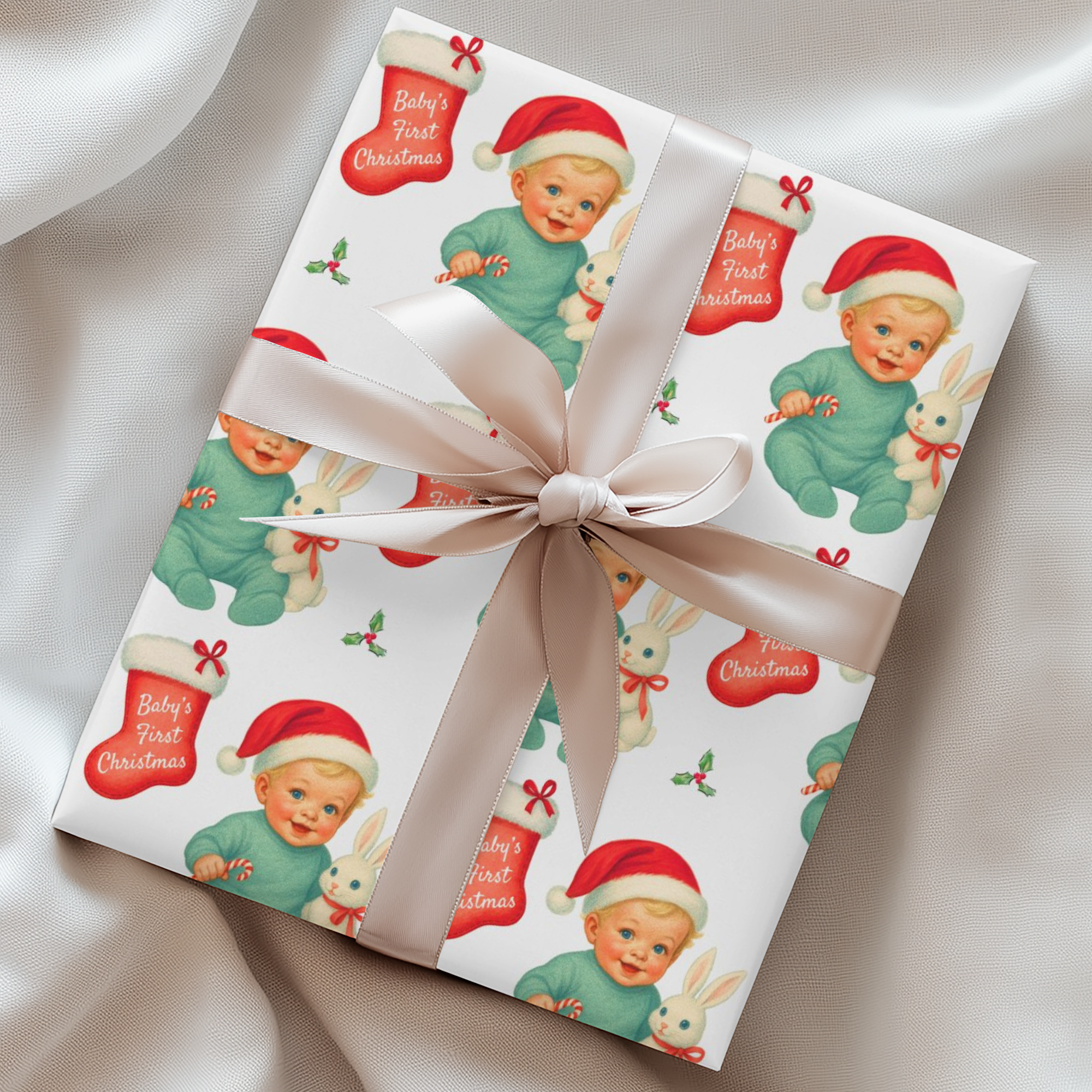 Vintage-style Baby’s First Christmas wrapping paper featuring a smiling blonde baby in a mint green romper and Santa hat holding a white bunny plush and candy cane, surrounded by red Christmas stockings and holly, retro storybook style.