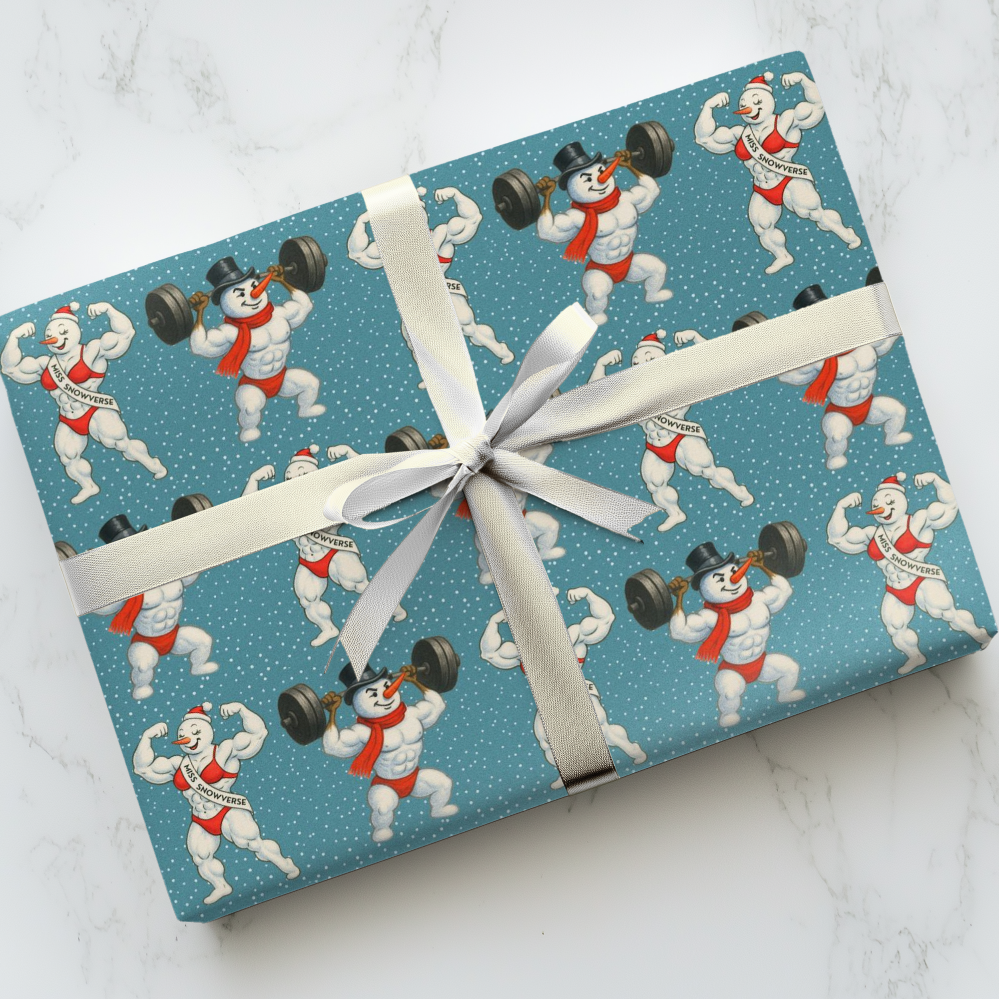 Funny retro fitness snowman wrapping paper with bodybuilder and snowman lifting weights on snowy blue background.