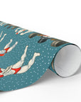 Funny retro muscle snowman wrapping paper with bodybuilder snowman lifting weights on snowy blue background.