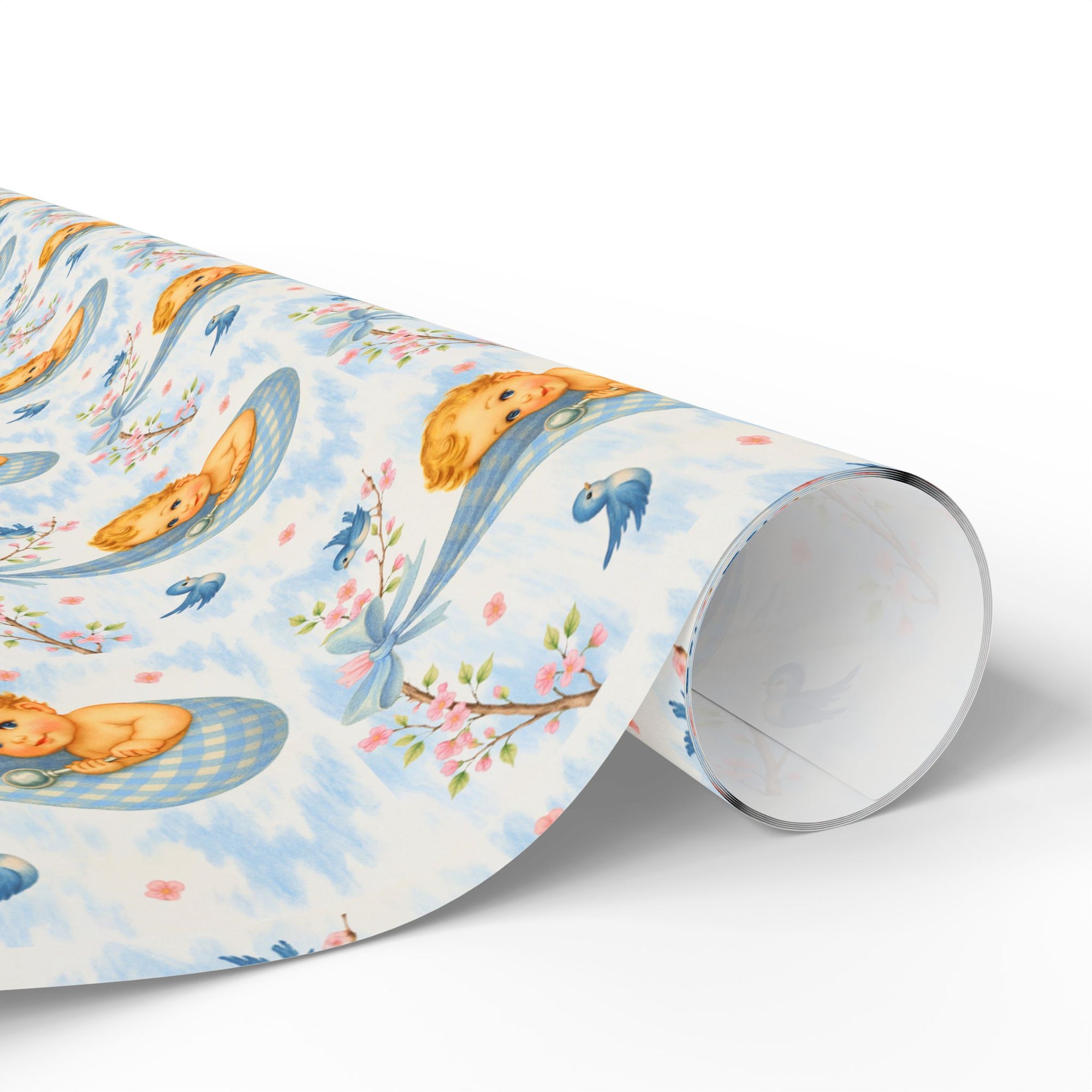 Roll of wrapping paper with baby, bluebird and cherry blossom design on a white background
