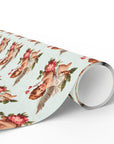 Roll of floral-patterned paper with a cherub illustration on a light background