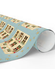 Whimsical Christmas dollhouse pattern with garlands and golden stars on dusty blue gift wrap.