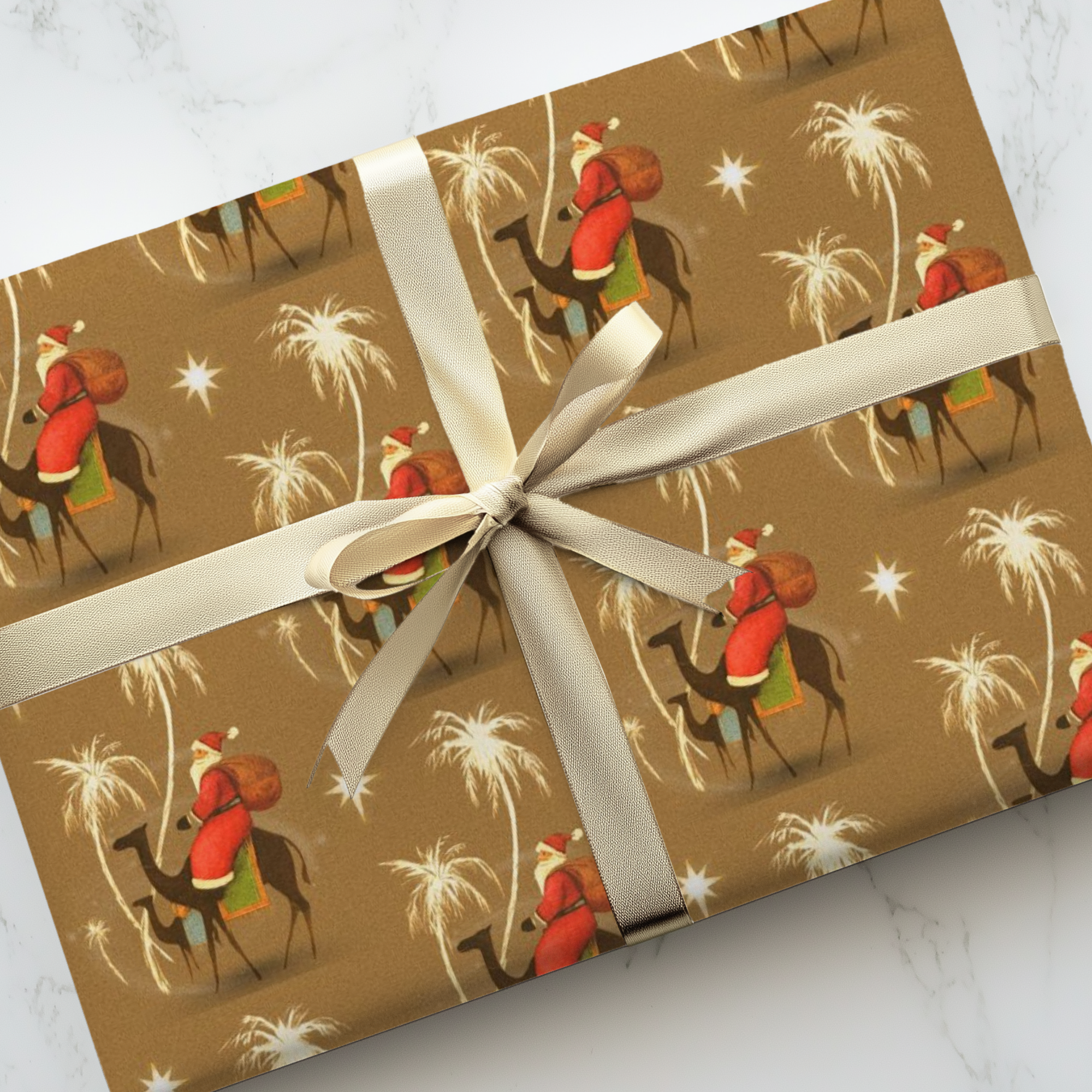 Santa riding camels under the Star of Bethlehem with golden palm trees Christmas Wrapping Paper