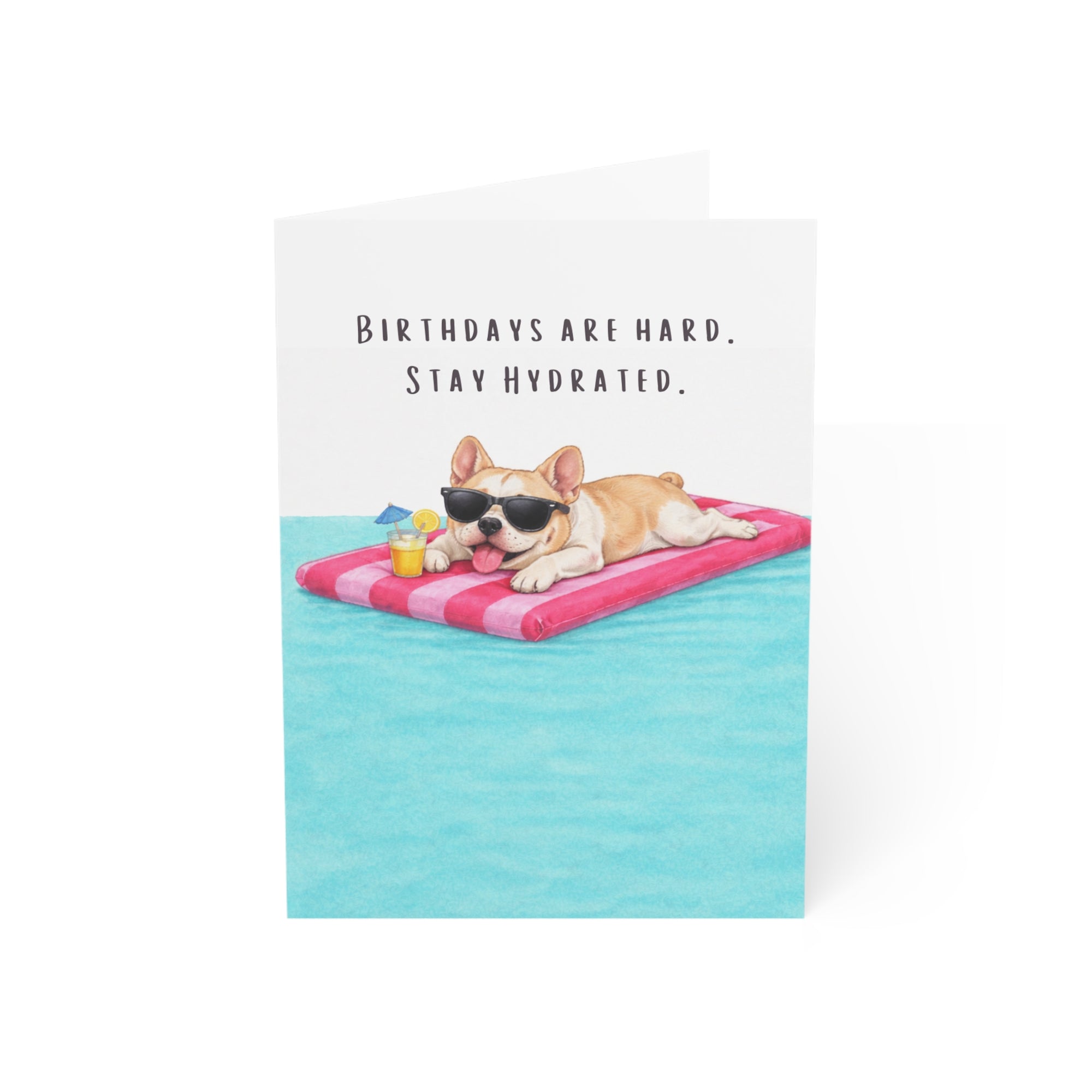 Birthday card with a frenchie dog on a pool float and text 'Birthdays are hard. Stay Hydrated.'