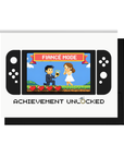 Gamer engagement card with pixel proposal scene and text Fiancé Mode Achievement Unlocked, with a corresponding black envelope in the background.