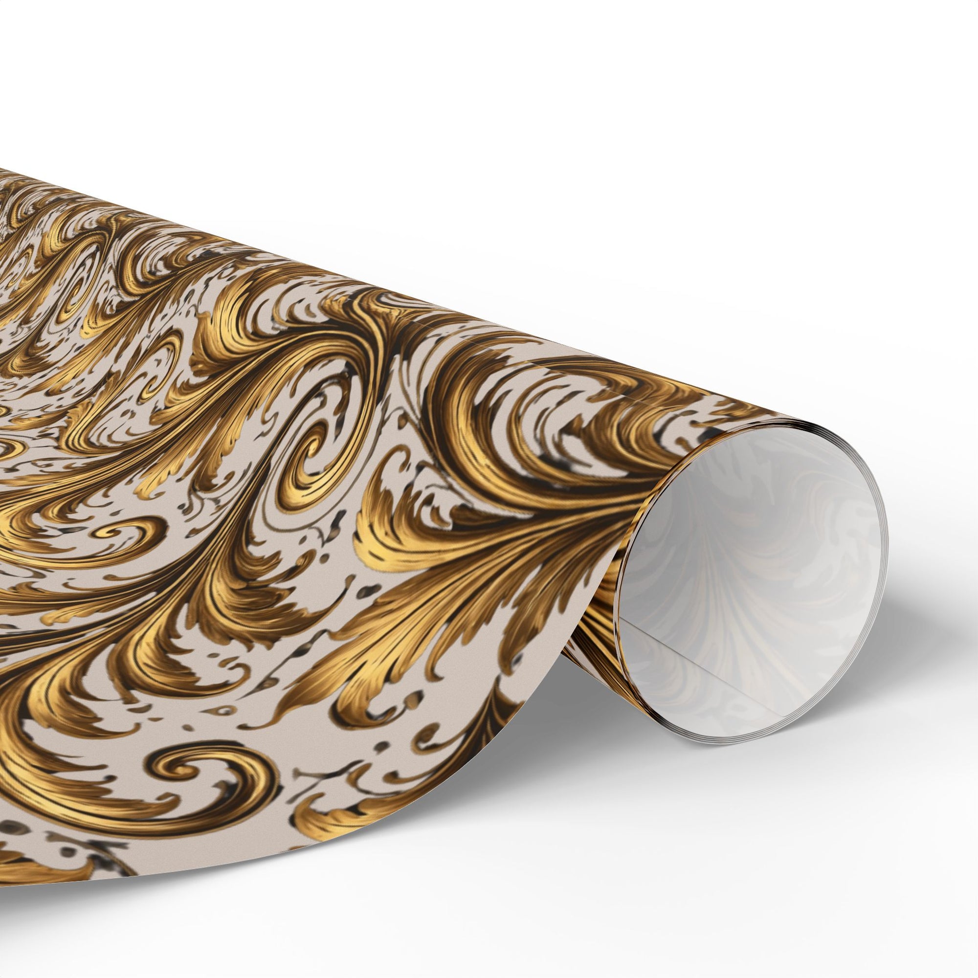 Wrapping paper roll of gold and gray scroll patterned paper on a white background