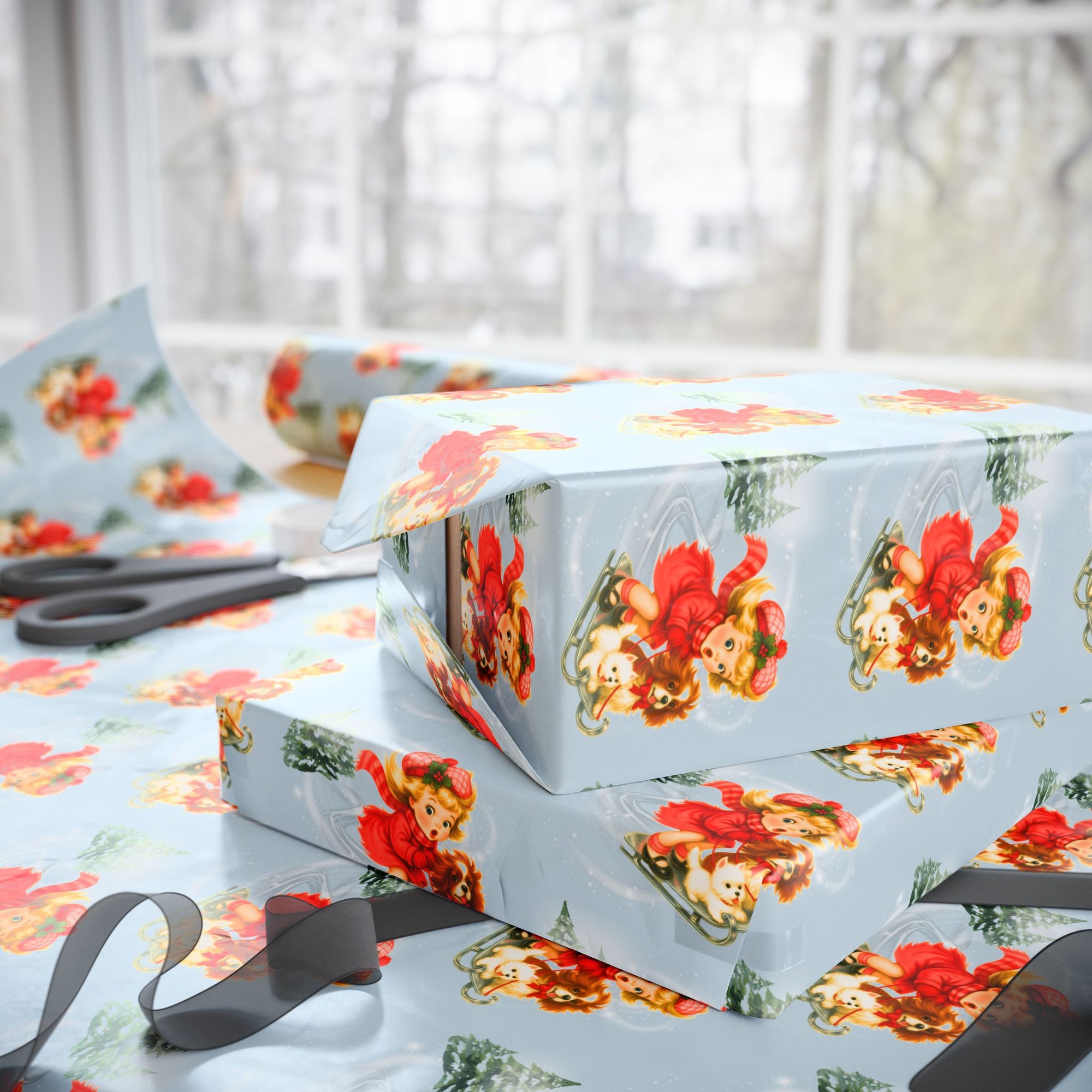 Vintage Christmas wrapping paper little girl sledding with westie and cavalier dogs on pale blue background with snowy pine trees.