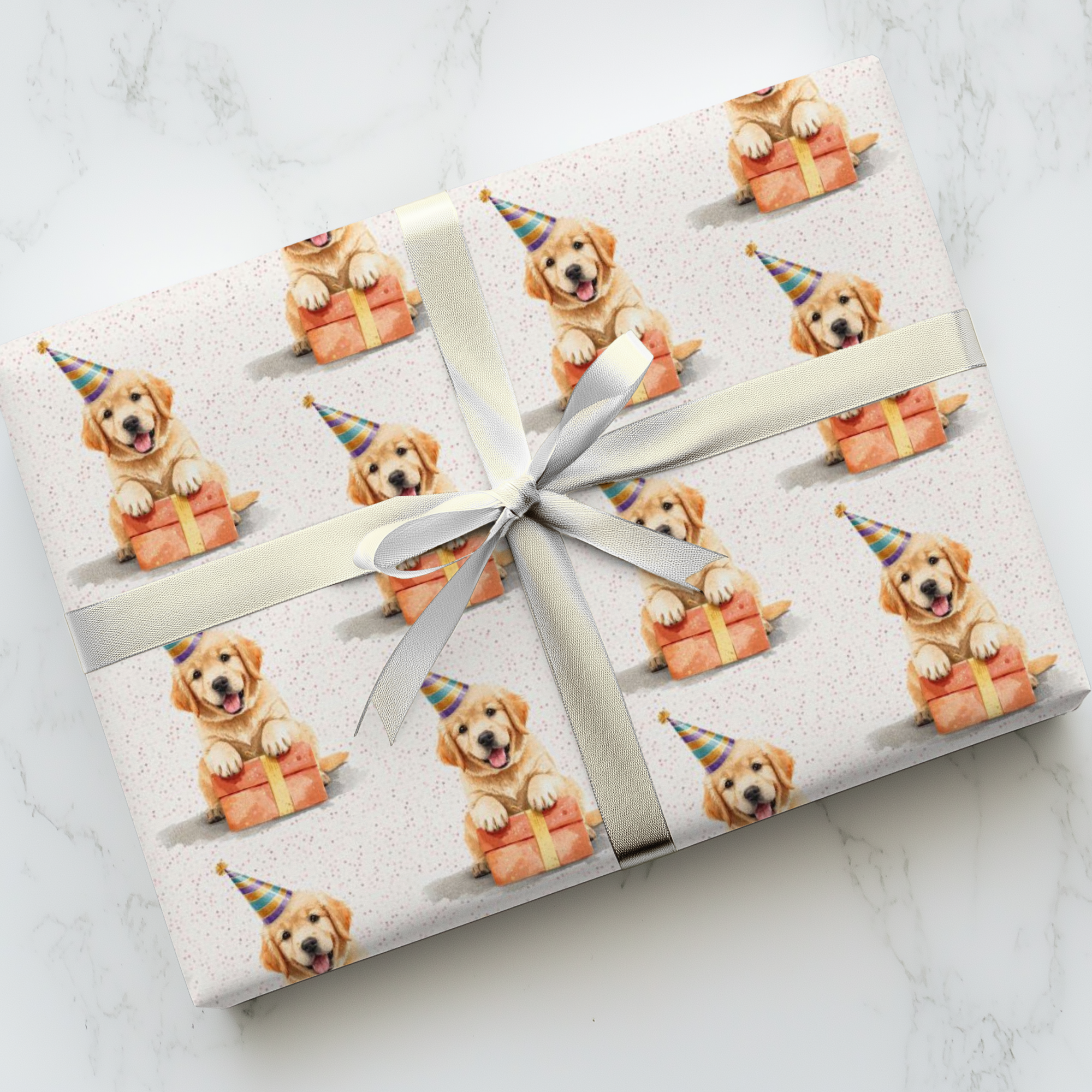 Birthday gift wrapped in paper with a pattern of golden retriever puppies in party hats with presents.
