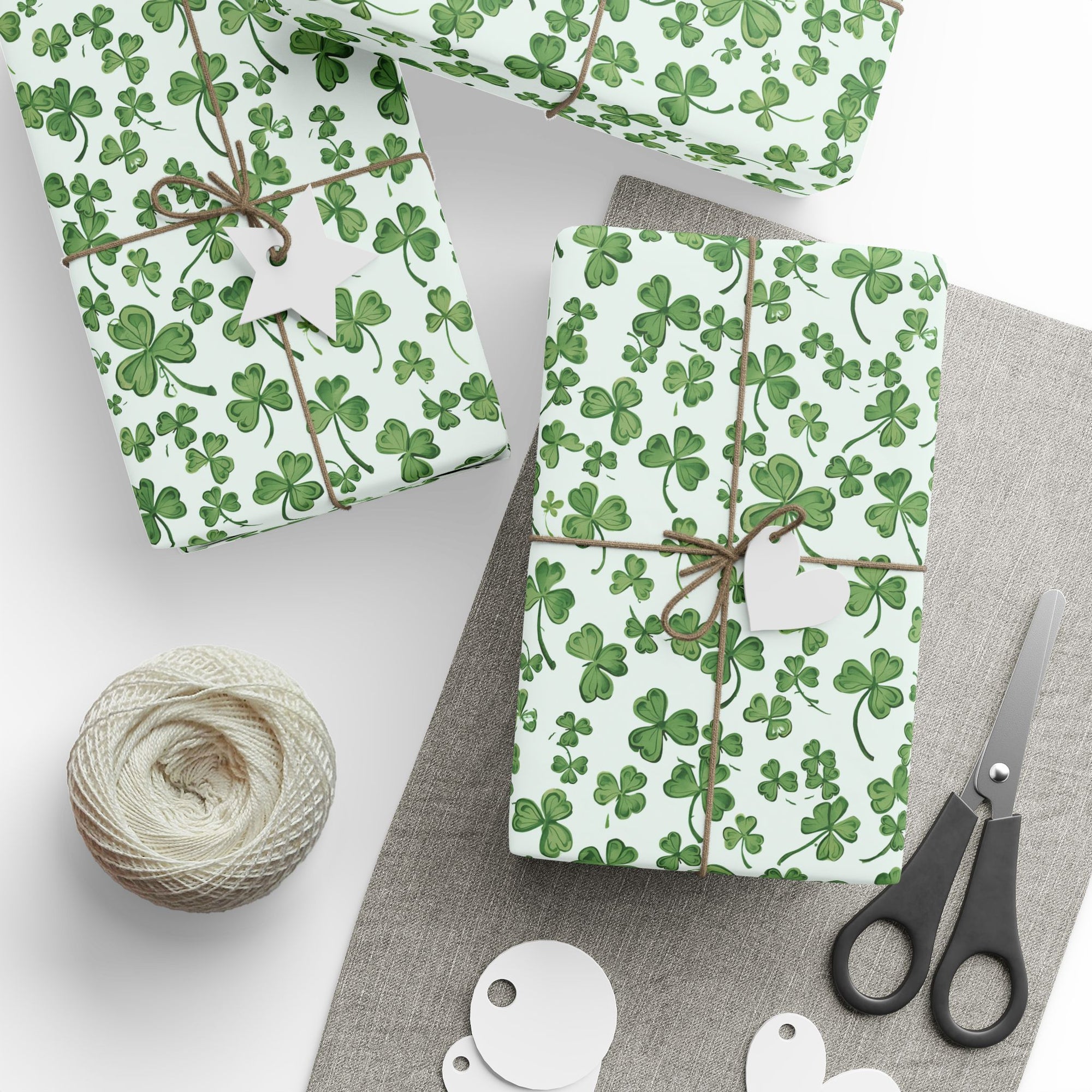 Gift boxes wrapped in green shamrock patterned wrapping paper