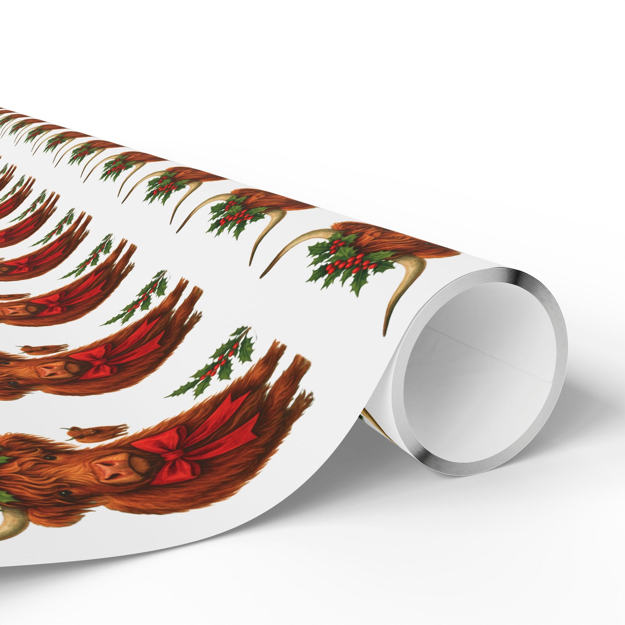 Roll of decorative paper with highland cow and holly design on a white background