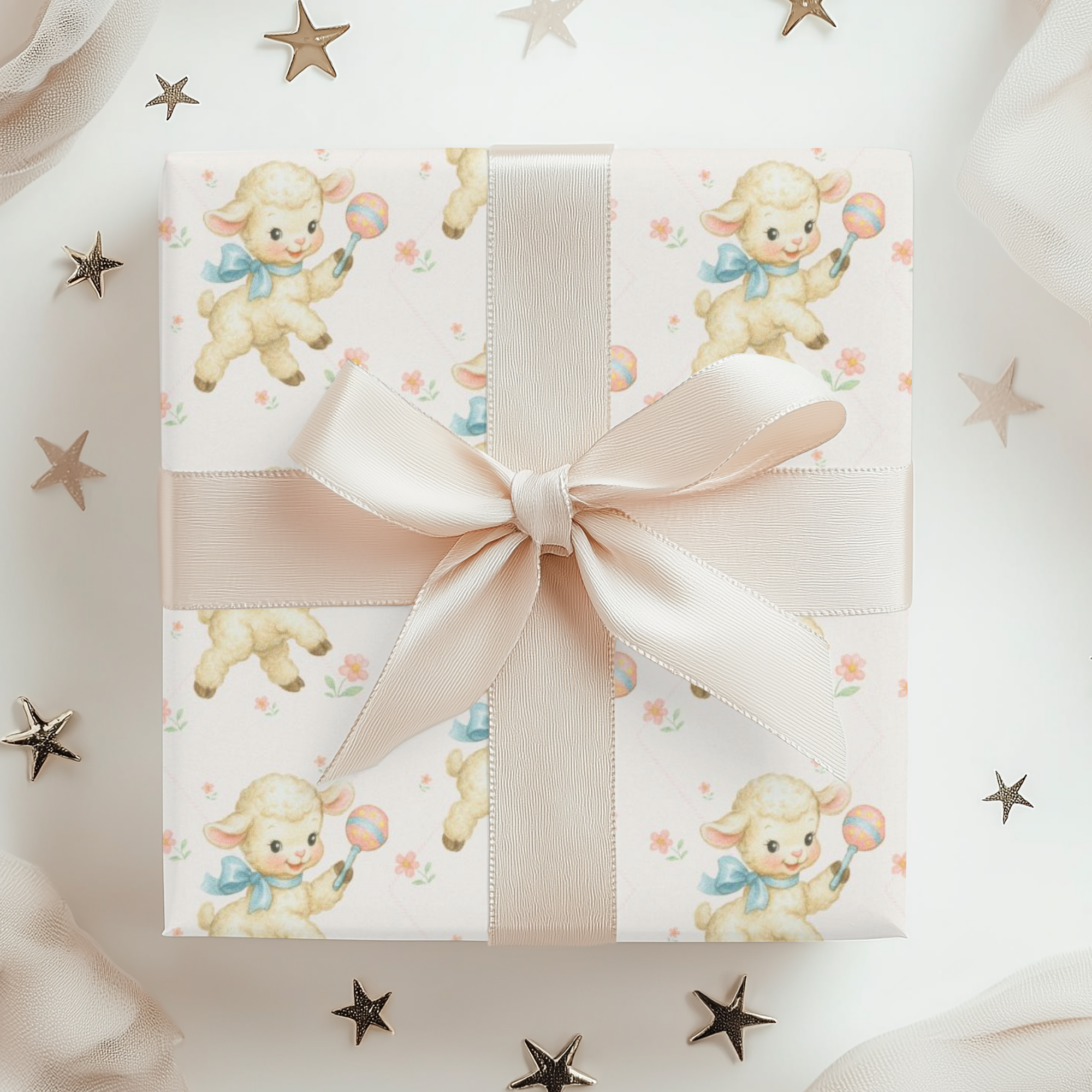 Gift box with lambs and pink ribbon on a white background with star decorations