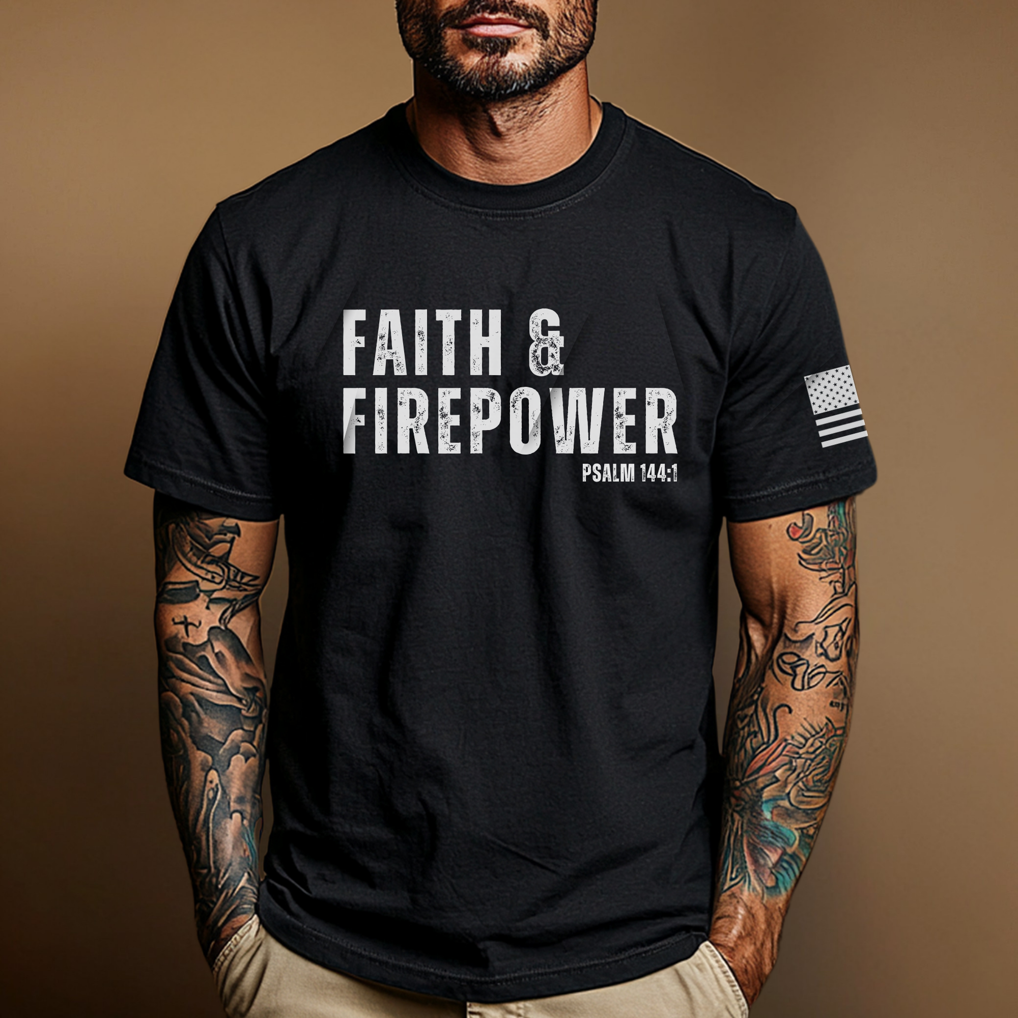 Man wearing a black t-shirt with 'Faith and firepower'' text and bible verse 'psalm 144:1