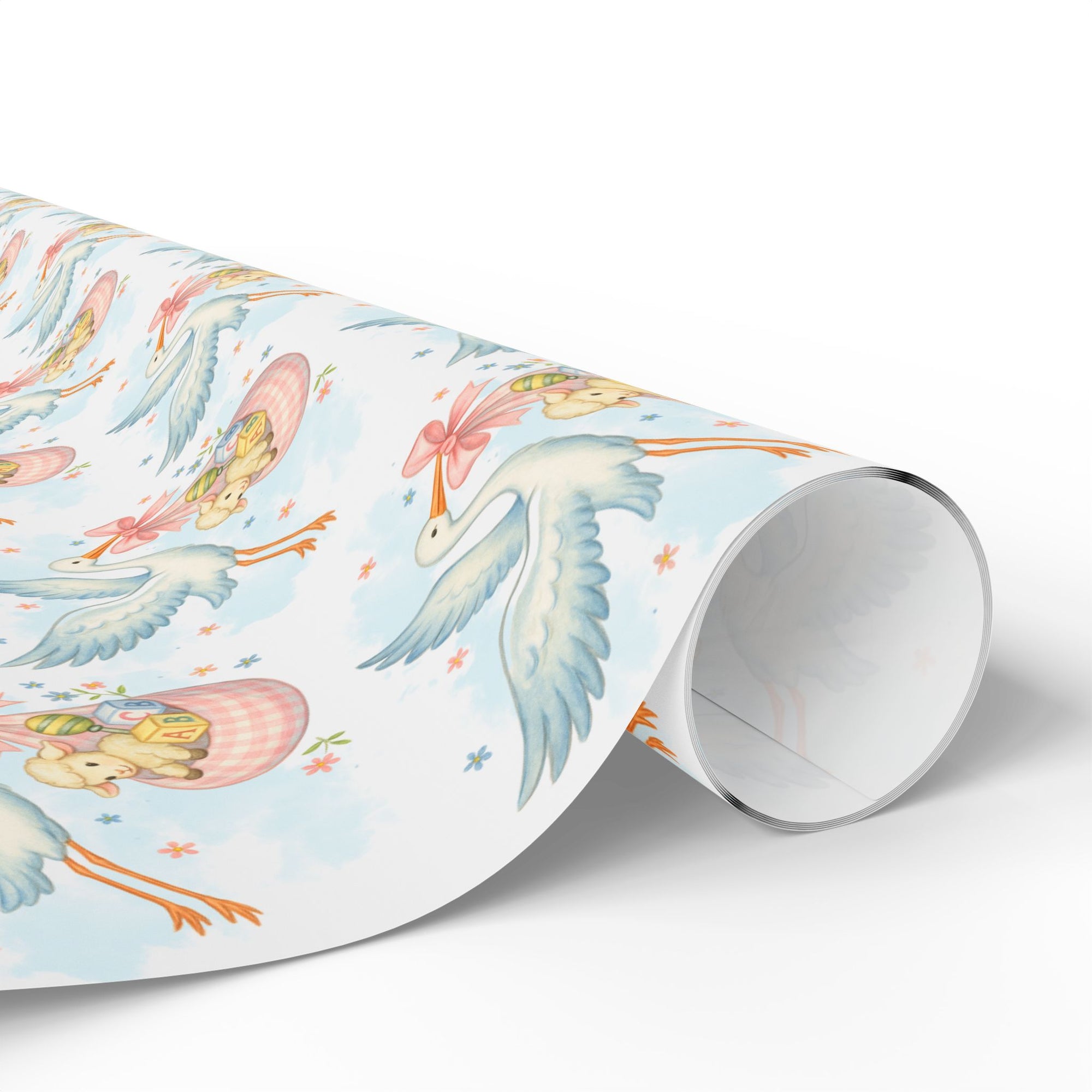 Roll of wrapping paper featuring a stork carrying a gingham sling of toys for new baby.