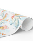 Roll of wrapping paper featuring a stork carrying a gingham sling of toys for new baby.