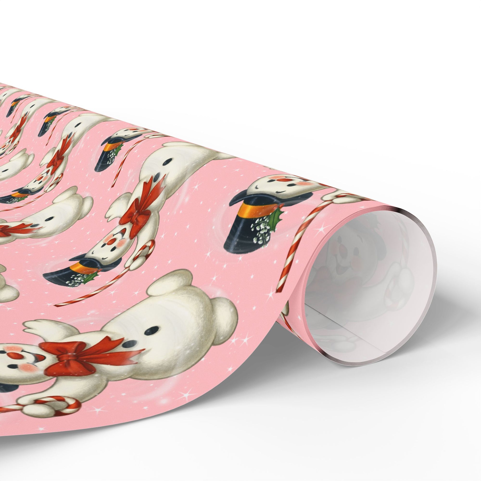 pink vintage snowman Christmas wrapping paper with mid-century snowmen holding candy canes on a pastel background