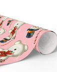 pink vintage snowman Christmas wrapping paper with mid-century snowmen holding candy canes on a pastel background