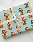 Christmas themed wrapping paper featuring a darling retro poodle in a santa cap on an aqua background.