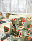 Christmas wrapping paper featuring a retro Santa flying a WW2 vintage airplane with gifts to deliver on a light green background
