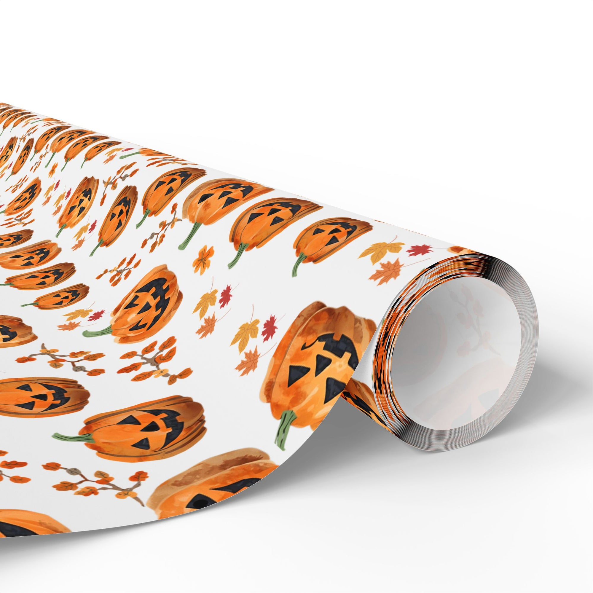 Roll of Halloween-themed wrapping paper with smiling jack-o'-lanterns and leaves on a white background.