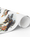 roll of christmas wrapping paper that has a snowman driving a vintage model t 