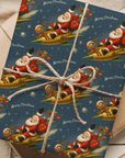 Vintage navy Christmas wrapping paper featuring Santa flying a golden rocket with reindeer and gifts in retro Space Age mid-century style.
