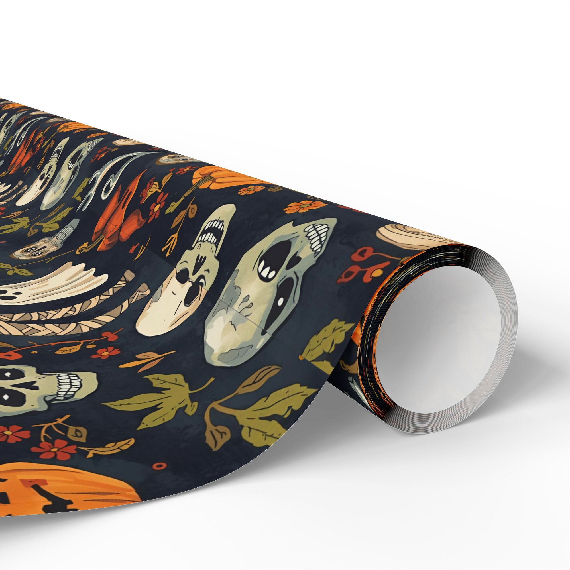 Halloween-themed gift wrap roll with skeletons, pumpkins, and mummies on a dark background