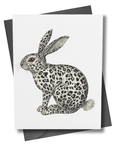 Greeting card with a spotted rabbit illustration on a white background with a gray envelope.