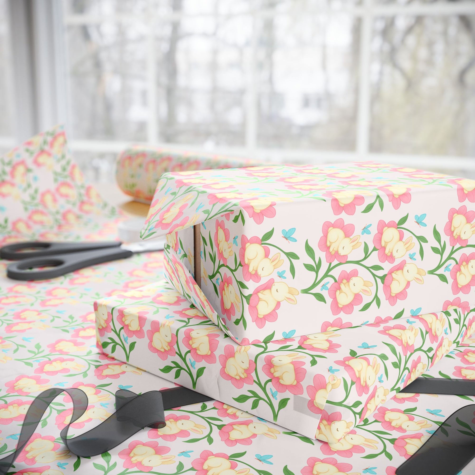 Spring wrapping paper with baby bunnies inside pink flowers and blue butterflies