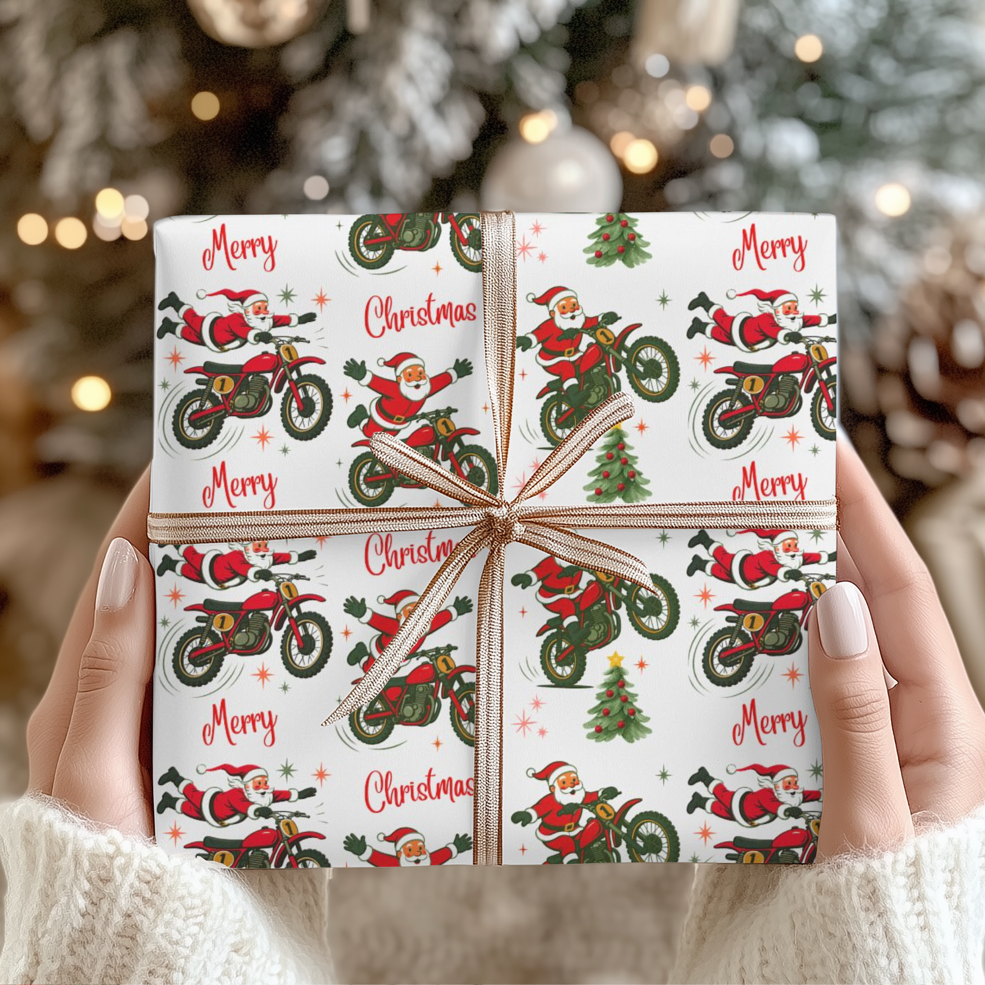 Christmas wrapping paper featuring Santa on a dirt bike doing tricks on a white background.