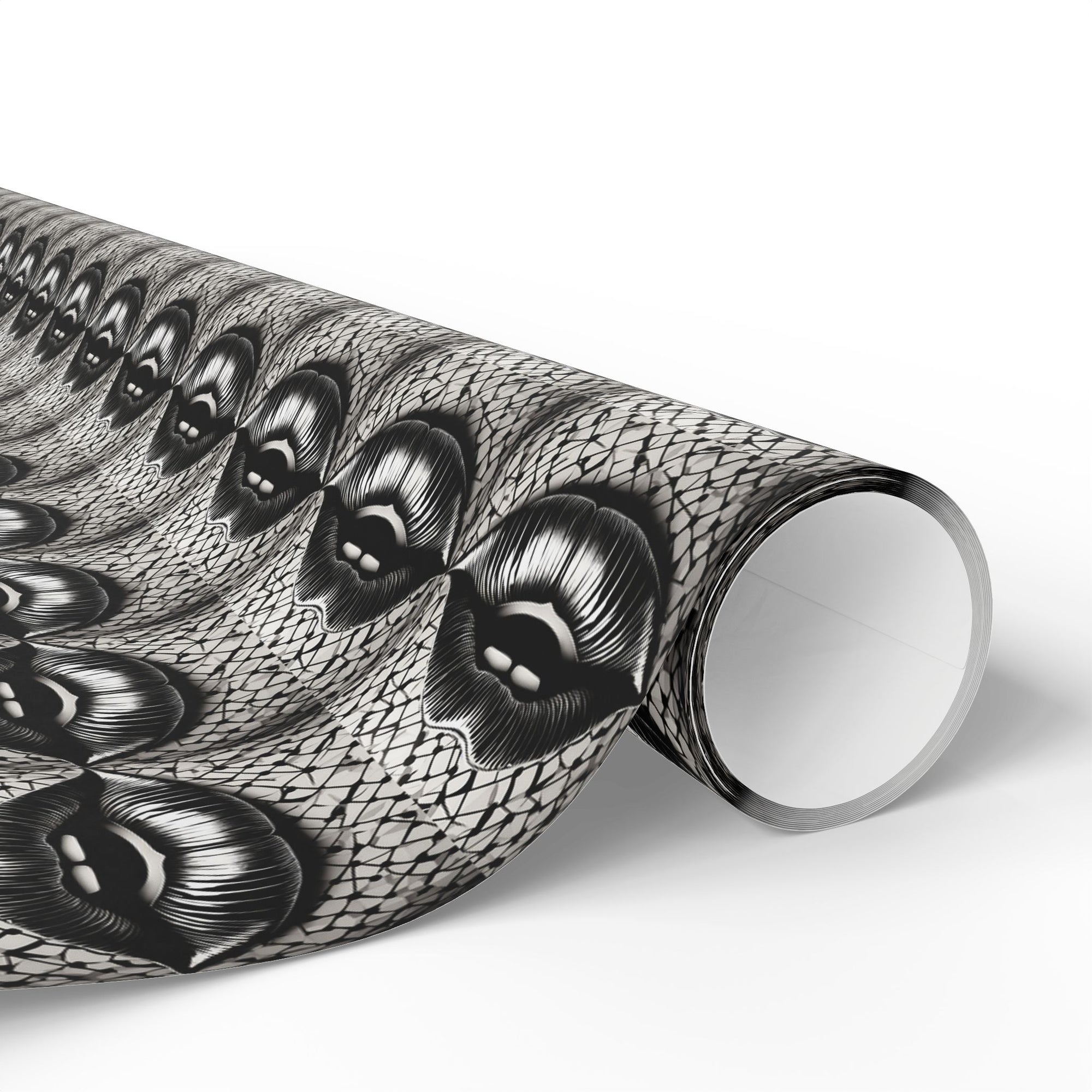 Roll of decorative paper with black and white surreal pattern of lips on a black and white background.