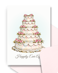 Card with a four-tier wedding cake illustration and 'Happily Ever After' text on a white background, with a corresponding pink envelope.