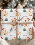 Christmas wrapping paper featuring a sweet westie dog in a santa hat skiing down alpine slopes, on a snowy background.