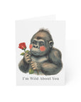 valentine card illustration of a gorilla holding a rose with 'I'm Wild About You' text on a white background