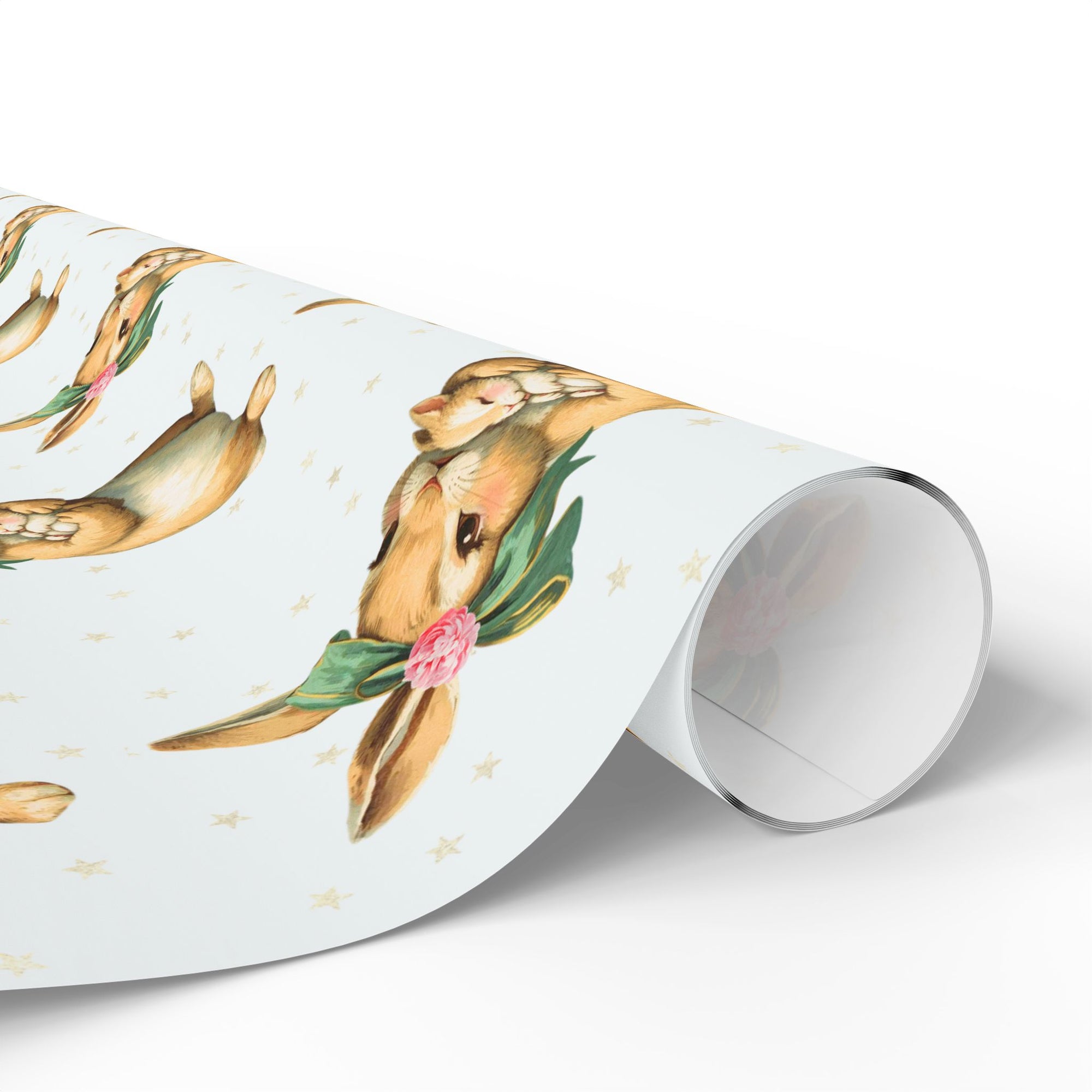 Roll of decorative paper with bunny mom and baby design on a white background.